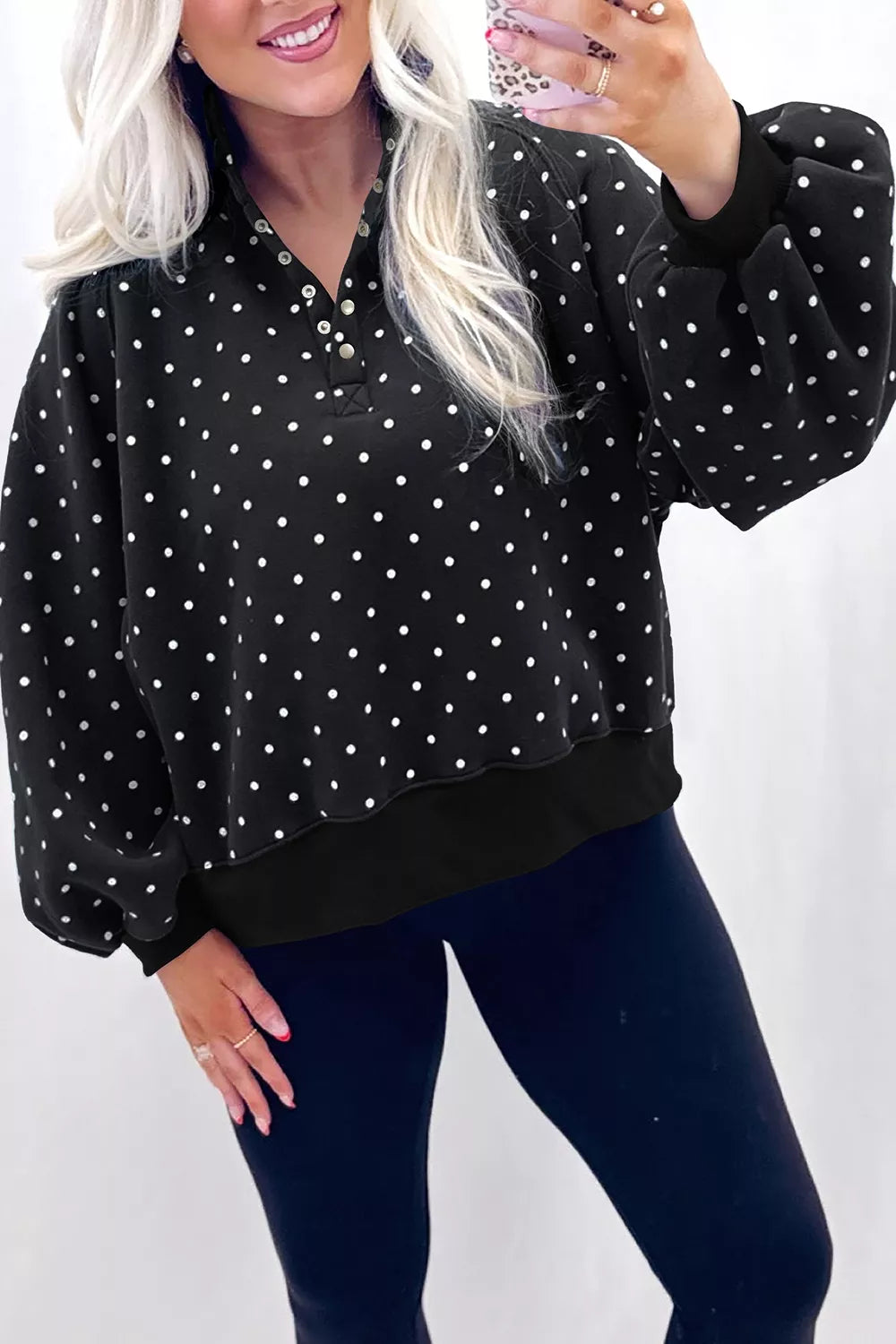 Camille Polka Dot Snap-Button Sweatshirt – Black in Black styled on model