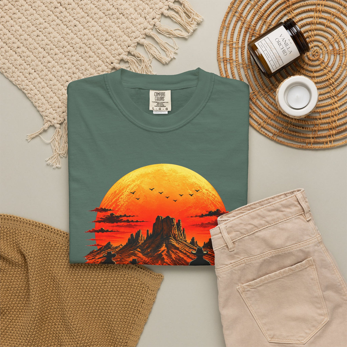 Blue Spruce Western Sunset Riders graphic tee in neutral flat-lay styling