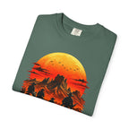 Western Sunset Riders artwork close-up on Blue Spruce Comfort Colors tee