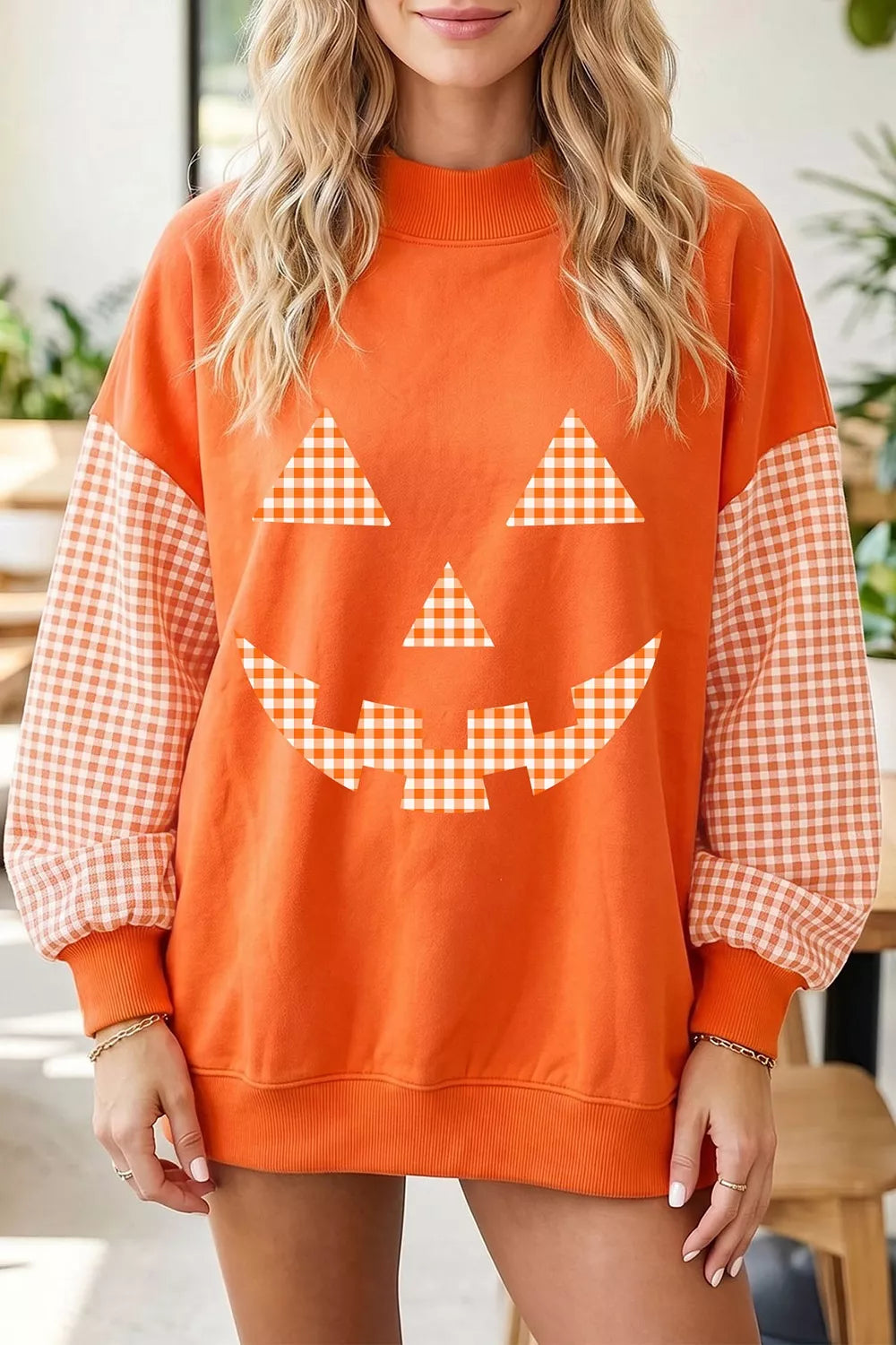 Pumpkin Patch Plaid-Sleeve Sweatshirt – Orange in Orange styled on model