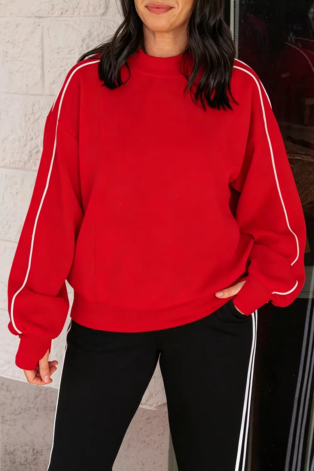 Reese Stand-Collar Sweatshirt – Red in Red styled on model